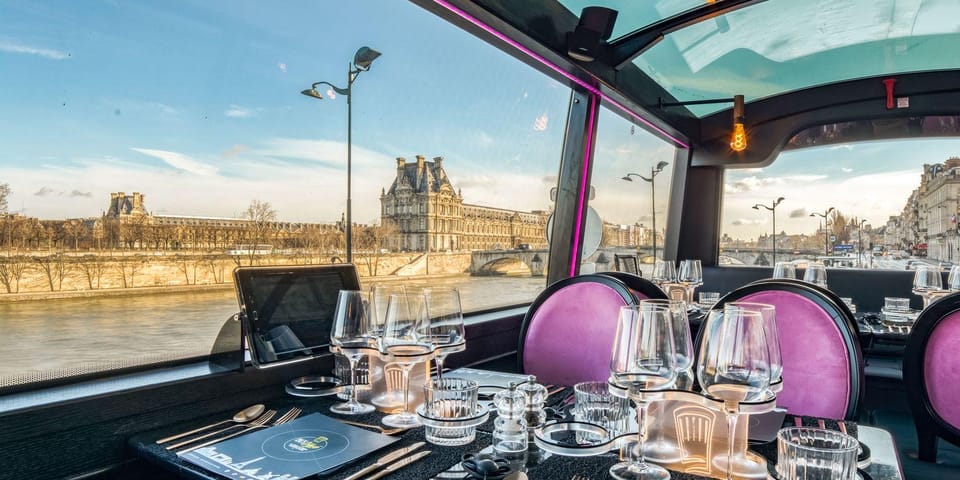 Bus Toqué Champs Elysées Tour w/ 3-Course Dinner & Champagne - The sightseeing experience from the Champs-Élysées direction