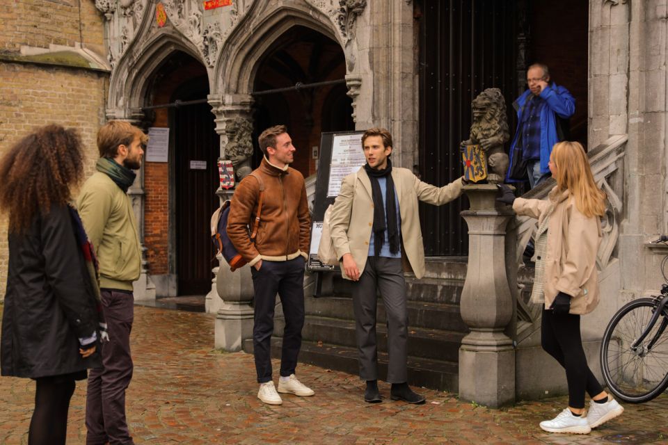 From Paris: Bruges Guided Tour with Hotel Pickup - Guided walking highlights: Town Hall, Place du Boulevard, and canal-view momentum