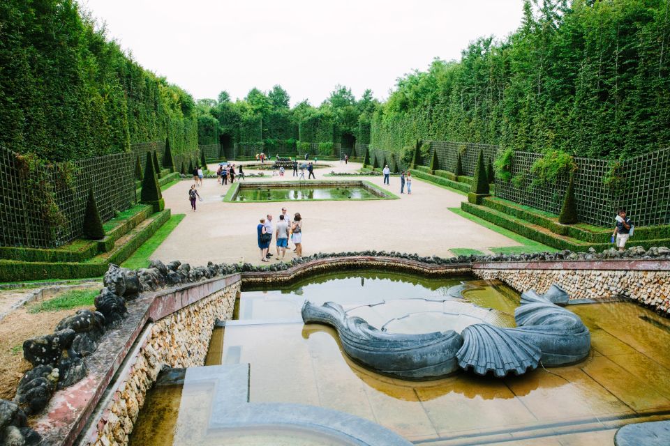 Gardens of Versailles Walking Tour & Palace Entry - Gardens route: Grande Perspective, Grand Canal, groves, and fountain moments