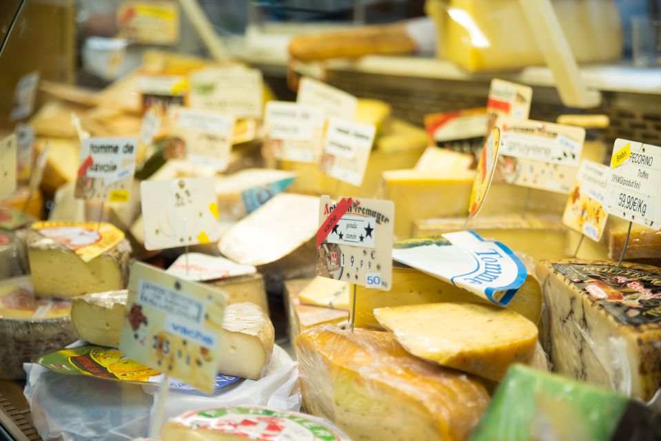 Left Bank Delicacies - Saint Germain des Prés - Finding the meeting point by the church and Louis Vuitton