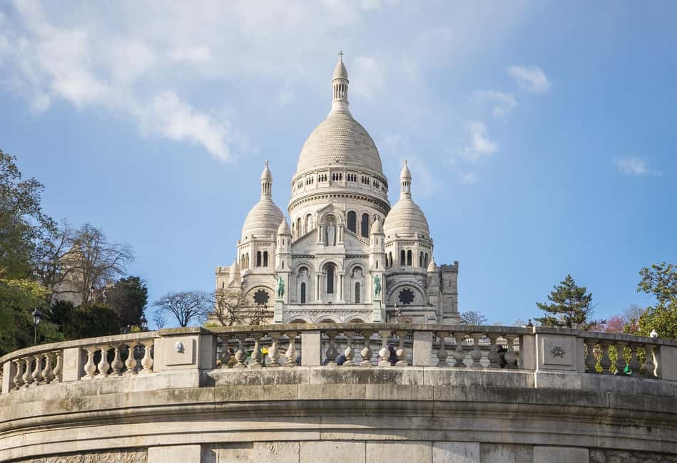 Montmartre Walking Tour in English - Cafe des Deux Moulins: Movie-Spot Energy Meets Real Neighborhood Life