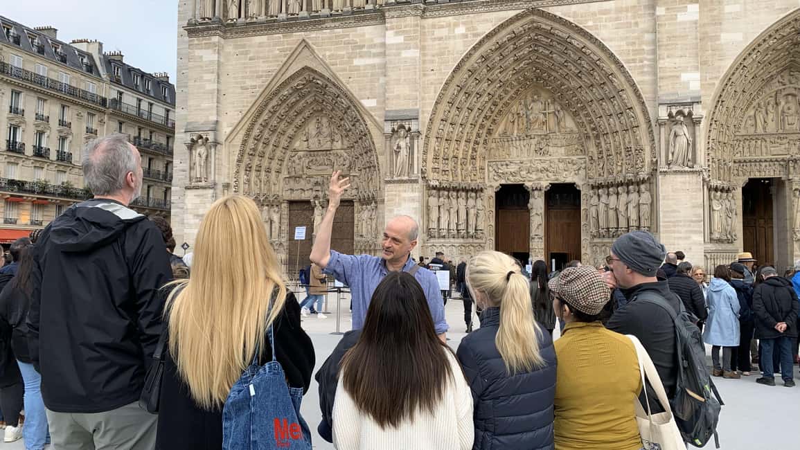 Notre-Dame Cathedral Exterior & Latin Quarter Guided Tour - Fontaine Saint-Michel: the opening scene with drama in stone