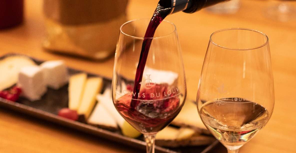 Paris: Apéro Wine and Cheese Tasting Experience - Inside Les Caves du Louvre: Private Cellar Atmosphere and Oak-Table Comfort