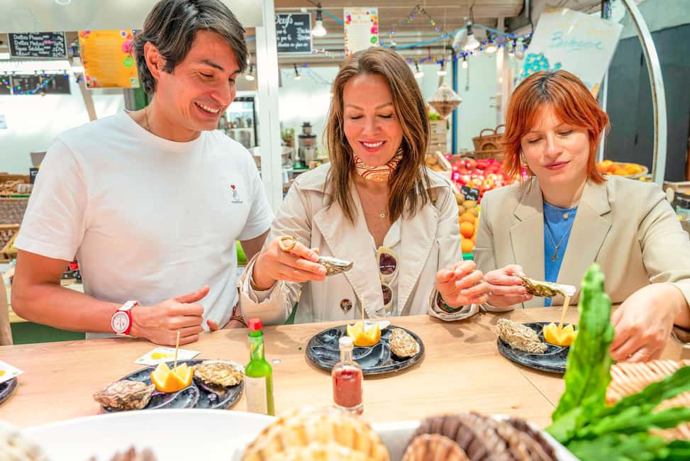 Paris: Authentic Food & Wine Tasting Tour in Le Marais - Stop 2: Le Marais streets and the covered-market cheese-and-sweets culture