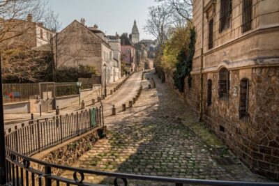 Paris: Charms of Montmartre Guided Walking Tour - Up the hill to Amélie and Van Gogh: cobblestones, stairs, and real corners