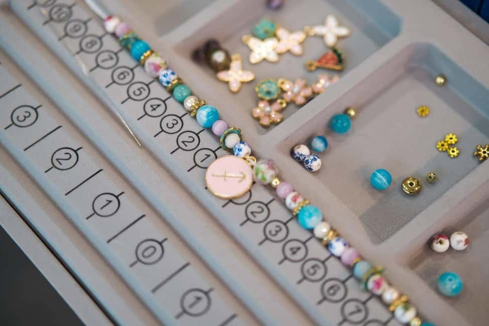 Paris: Custom Souvenir Bracelet Workshop - Small Snags to Plan For: Drinks, Letter Beads, and End-of-Session Flow