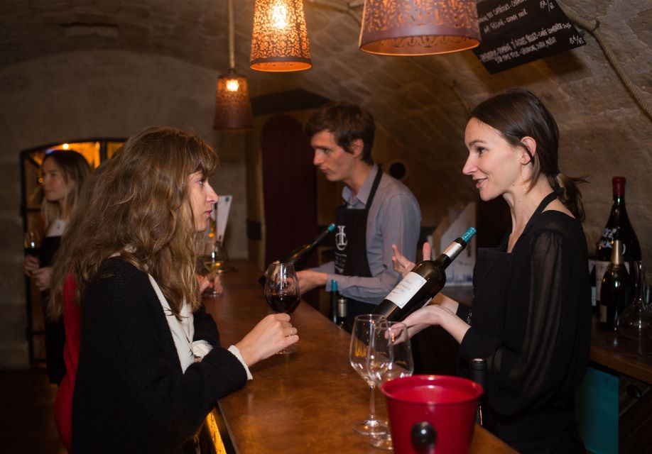 Paris: French Wine Experience in Parisian Cellar - Caves du Louvre: a Paris wine setting with built-in atmosphere