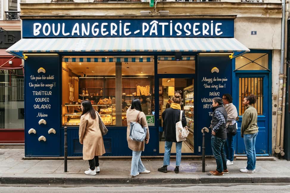 Paris: Gourmet Food Tour with Over 10 Tastings and Wine - Getting to La Comédie Française and finding your guide fast