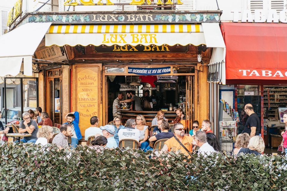 Paris: Montmartre Food and Wine Guided Tour - Sweet Stops: Macarons, Choux à la Crème, and Artisan Chocolate
