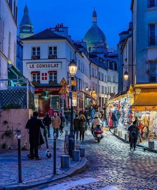Paris: Montmartre Hill & Sacré-Cœur Guided Walking Tour - First steps in Montmartre: from the Moulin Rouge area to uphill old streets