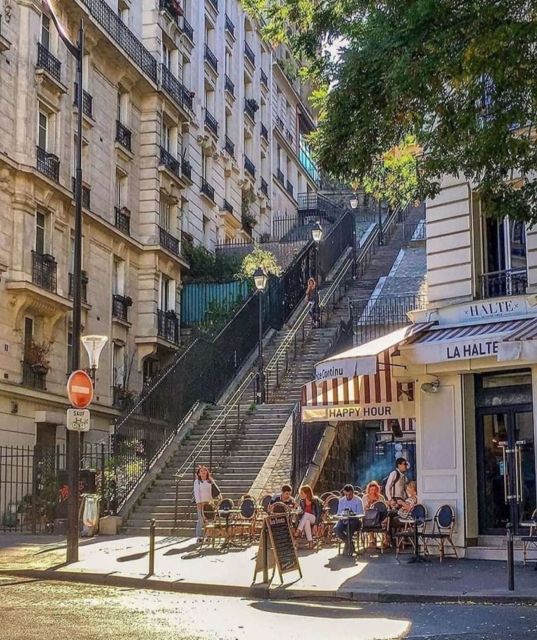 Paris: Montmartre Hill & Sacré-Cœur Guided Walking Tour - Walking Rue Abbesses and the artist streets: why these lanes feel different
