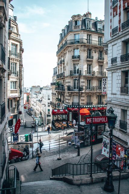 Paris: Montmartre Tour with Local Guide - La Maison Rose, Dalida’s bust, and Le Lapin Agile legends