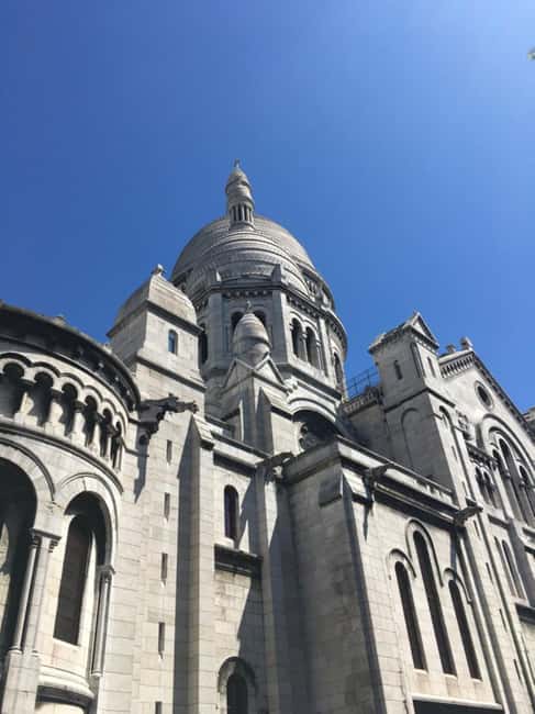 Paris: Montmartre Walking Tour with Sacré-Cœur Entry Option - The Abbesses Metro start: a smart way to get oriented fast