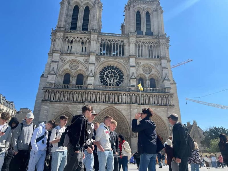Paris: Notre-Dame Cathedral Exterior Tour & Free Entrance - Exterior Highlights: Gargoyles, Rosettes, Spires, and the 2019 Fire Story