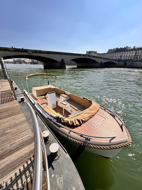 Paris: Private Small Boat Cruise with Rosé and Macarons - Louvre and Notre-Dame: the river-level view you can’t get on foot