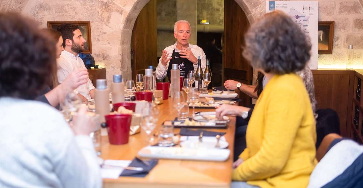 Paris: The Ultimate Wine and Cheese Tasting in English - Stepping Into Les Caves du Louvre: The Setting Matters