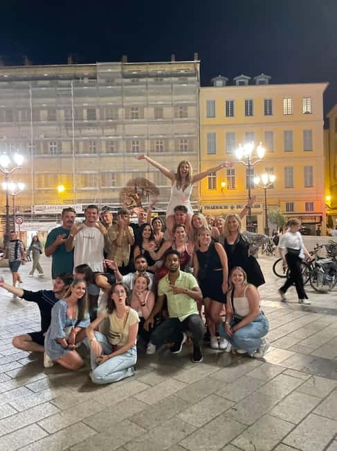 Pub Crawl Paris: Drink, Laugh, Meet the World - The Guide Factor: Games, Photos, and Why Gigi Gets Mentioned
